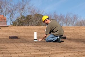 How to Handle a Roof Leak While Waiting for Help